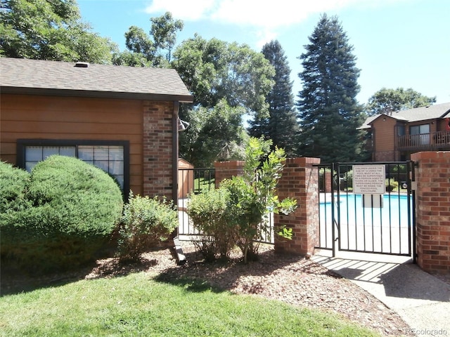 2215 S Buckley Rd Unit 201, Aurora, CO 80013 - view of yard featuring a gate