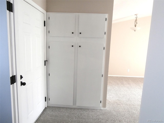 2215 S Buckley Rd Unit 201, Aurora, CO 80013 - hall featuring light colored carpet and baseboards