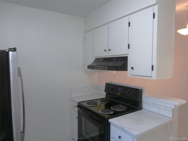 2215 S Buckley Rd Unit 201, Aurora, CO 80013 - kitchen featuring under cabinet range hood, black range with electric stovetop, fridge, white cabinetry, and decorative backsplash