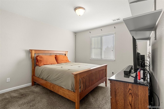 bedroom with visible vents, baseboards, and carpet flooring