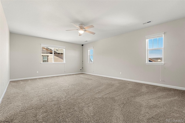 21028 E Saratoga Ave, Aurora, CO 80015 - empty room with a ceiling fan and carpet flooring