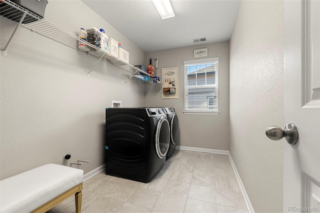 21028 E Saratoga Ave, Aurora, CO 80015 - laundry area featuring separate washer and dryer and baseboards