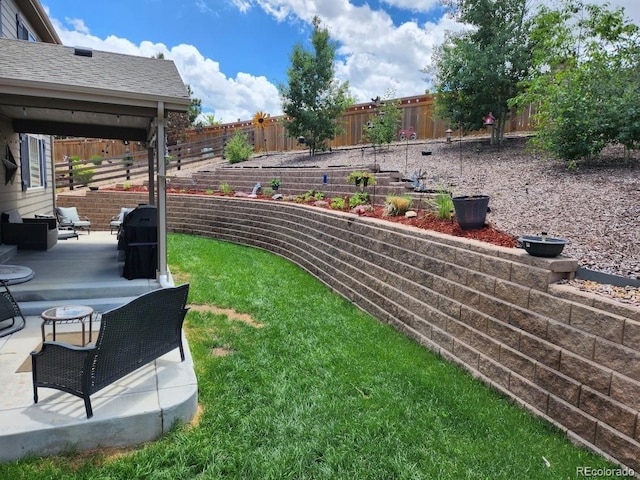 21028 E Saratoga Ave, Aurora, CO 80015 - fenced backyard with a patio