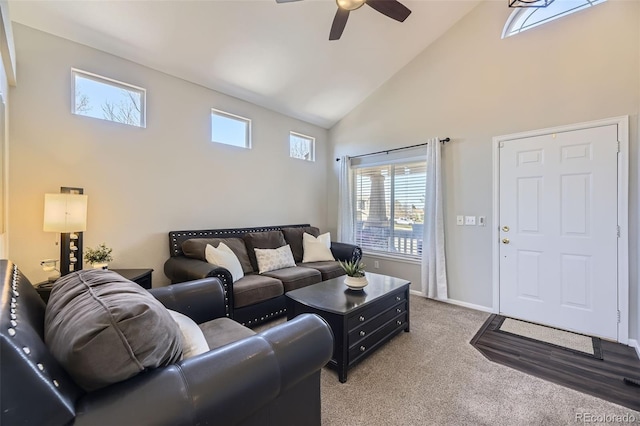 4708 Rock Pipit Ct, Highlands Ranch, CO 80126 - living room with high vaulted ceiling, ceiling fan, light carpet, and healthy amount of natural light