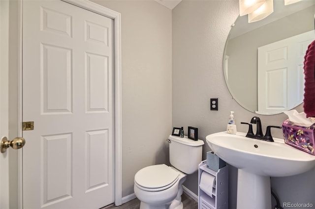 4708 Rock Pipit Ct, Highlands Ranch, CO 80126 - half bath featuring toilet and a sink
