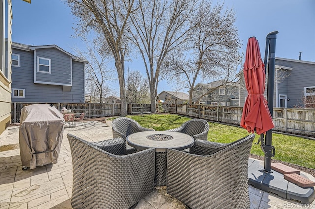 4708 Rock Pipit Ct, Highlands Ranch, CO 80126 - view of patio / terrace with an outdoor fire pit and a residential view