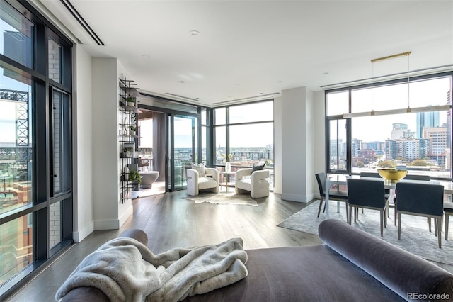 sunroom / solarium with a view of city and plenty of natural light