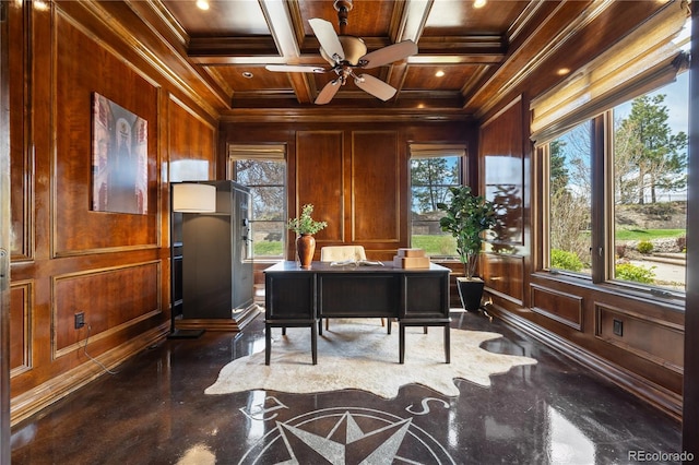 office space with ornamental molding, wooden walls, and a healthy amount of sunlight