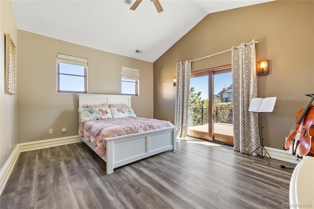 bedroom featuring access to outside, visible vents, multiple windows, and wood finished floors