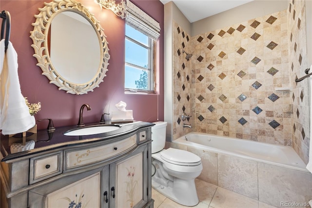 full bath featuring tiled shower / bath combo, toilet, tile patterned flooring, and vanity