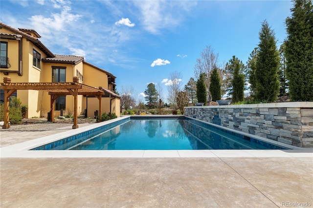 view of swimming pool featuring a fenced in pool