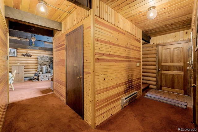 hallway with beamed ceiling, carpet flooring, wood ceiling, and wooden walls