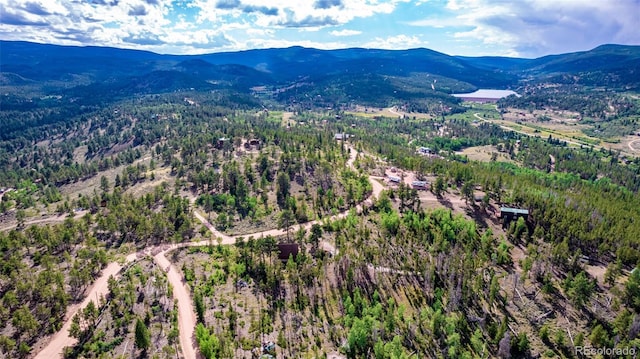 bird's eye view with a mountain view