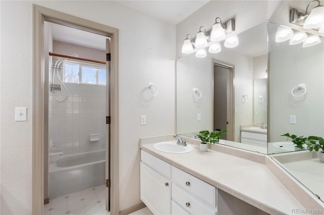 bathroom featuring tile patterned floors, shower / tub combination, and vanity