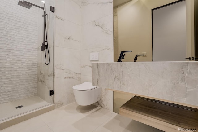 full bathroom with toilet, a shower stall, tile walls, and tile patterned floors