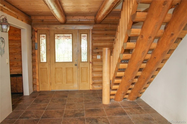 tiled entryway featuring beamed ceiling, log walls, and wooden ceiling