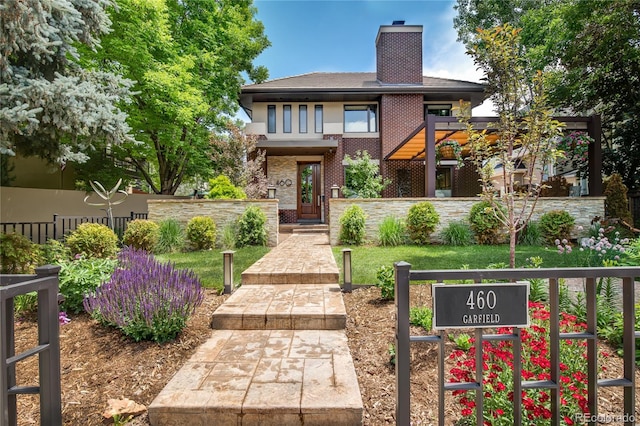 460 N Garfield St, Denver, CO 80206 - view of front facade with brick siding and a chimney