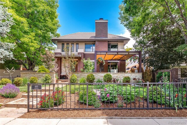 460 N Garfield St, Denver, CO 80206 - view of front of house with a chimney, brick siding, and stucco siding