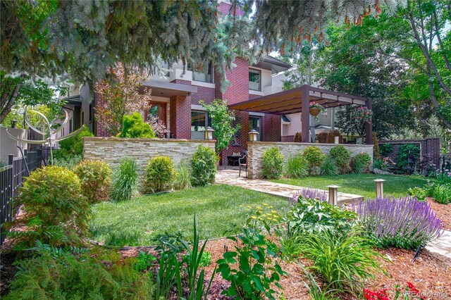 460 N Garfield St, Denver, CO 80206 - view of front of home featuring brick siding and a pergola