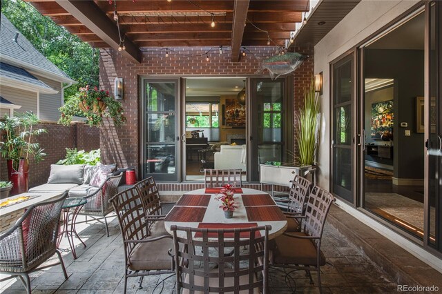 460 N Garfield St, Denver, CO 80206 - view of patio with a fire pit and outdoor dining space