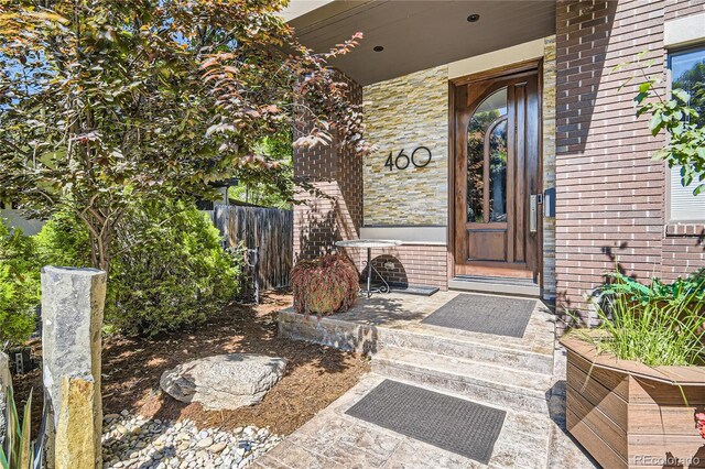 460 N Garfield St, Denver, CO 80206 - entrance to property featuring brick siding