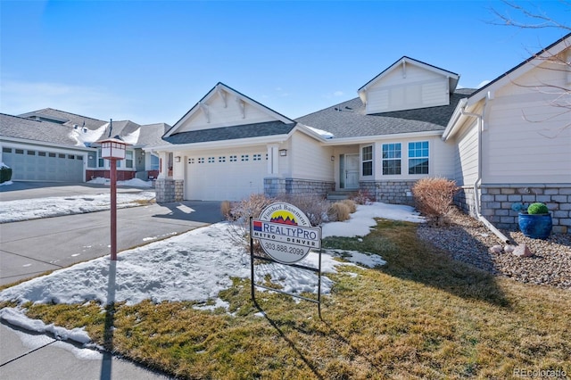 view of front of home with a garage