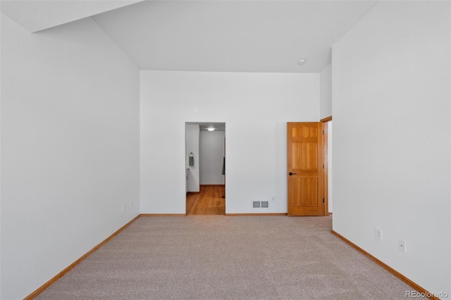 unfurnished bedroom with light carpet