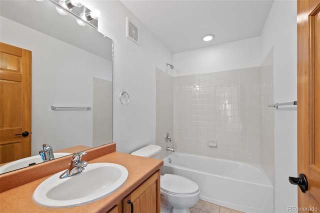 full bathroom featuring vanity, shower / washtub combination, and toilet