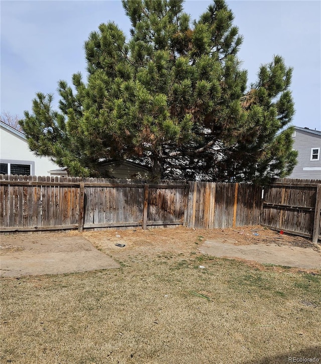 view of yard with fence