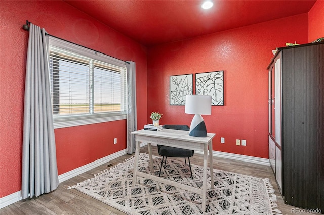 office area featuring hardwood / wood-style floors