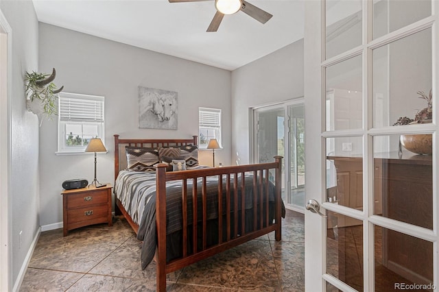 bedroom featuring ceiling fan, french doors, access to exterior, and multiple windows