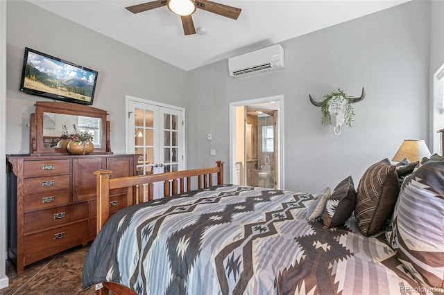 bedroom featuring multiple windows, connected bathroom, french doors, a wall unit AC, and ceiling fan