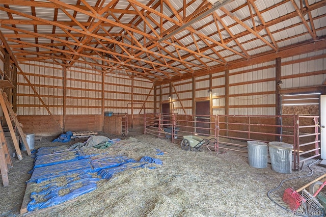 miscellaneous room featuring lofted ceiling