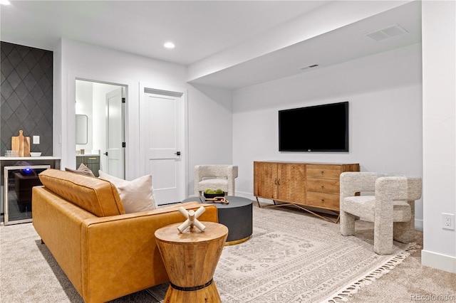 living room featuring light colored carpet