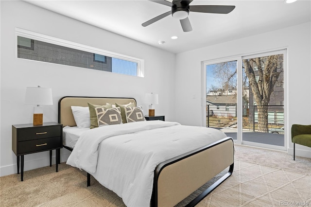 bedroom with ceiling fan, light carpet, multiple windows, and access to outside