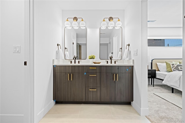 bathroom featuring tile patterned floors and vanity