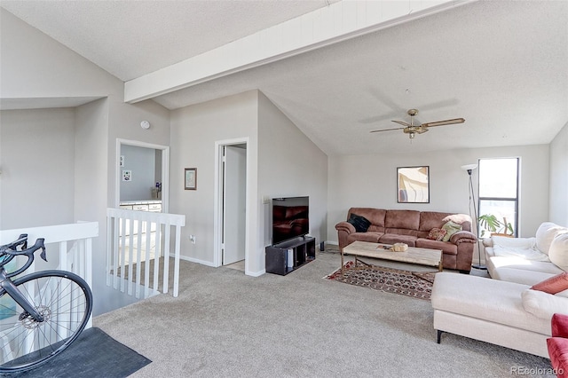 8917 E Chenango Ave, Greenwood Village, CO 80111 - carpeted living room with vaulted ceiling, a ceiling fan, and baseboards