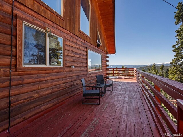 451 Harris Dr, Idaho Springs, CO 80452 - wooden deck featuring a mountain view