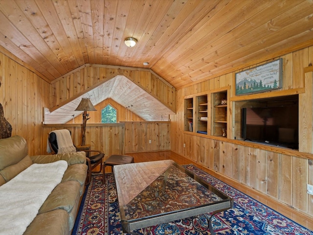 451 Harris Dr, Idaho Springs, CO 80452 - living area with wood walls, vaulted ceiling, built in shelves, and wood ceiling