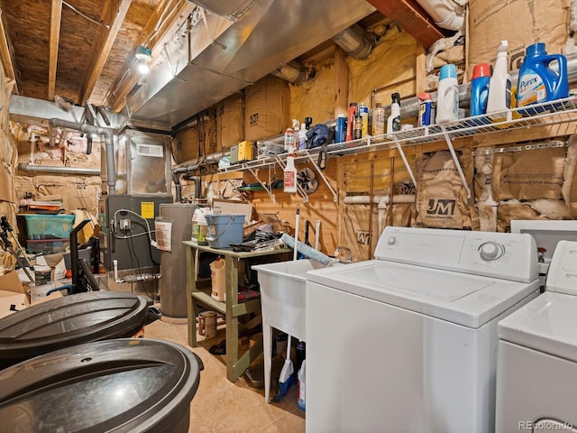 451 Harris Dr, Idaho Springs, CO 80452 - clothes washing area featuring washer and dryer and water heater