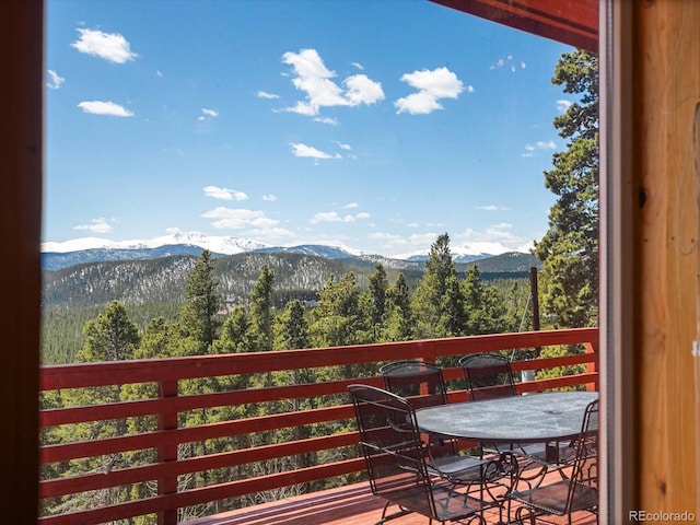 451 Harris Dr, Idaho Springs, CO 80452 - balcony with a mountain view, outdoor dining space, and a forest view