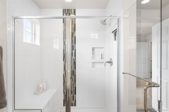 bathroom featuring a shower stall