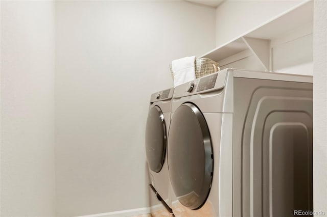 laundry room featuring washing machine and dryer