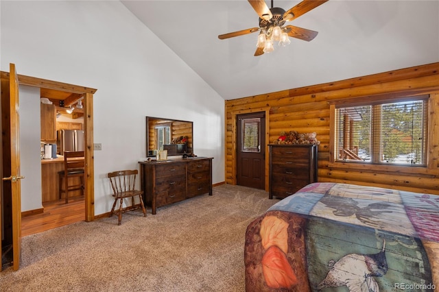 bedroom featuring high vaulted ceiling, carpet floors, baseboards, log walls, and freestanding refrigerator