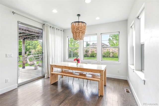 11880 W 38th Pl, Wheat Ridge, CO 80033 - dining space with healthy amount of natural light, a chandelier, recessed lighting, dark wood-type flooring, and baseboards