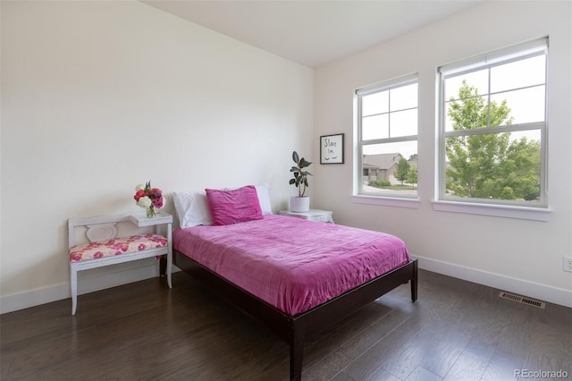 11880 W 38th Pl, Wheat Ridge, CO 80033 - bedroom with baseboards and wood finished floors