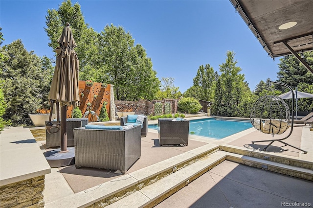 9470 S Silent Hills Dr, Lone Tree, CO 80124 - view of pool with a patio area and an outdoor living space