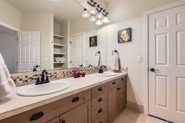 9470 S Silent Hills Dr, Lone Tree, CO 80124 - bathroom with double vanity, tile patterned flooring, baseboards, and backsplash