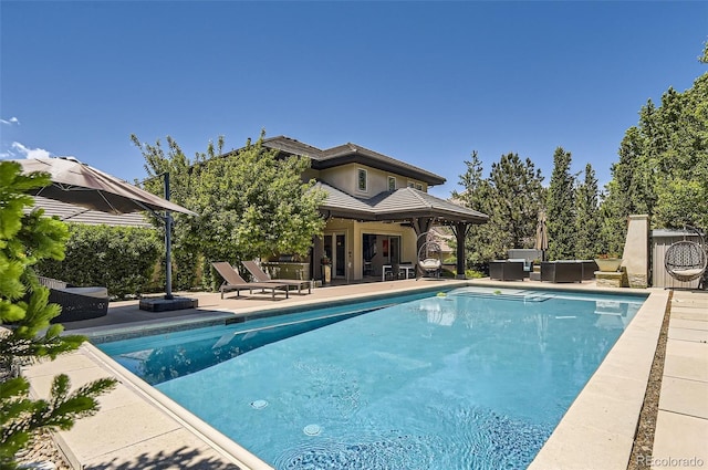 9470 S Silent Hills Dr, Lone Tree, CO 80124 - view of pool with an outdoor hangout area and a patio area