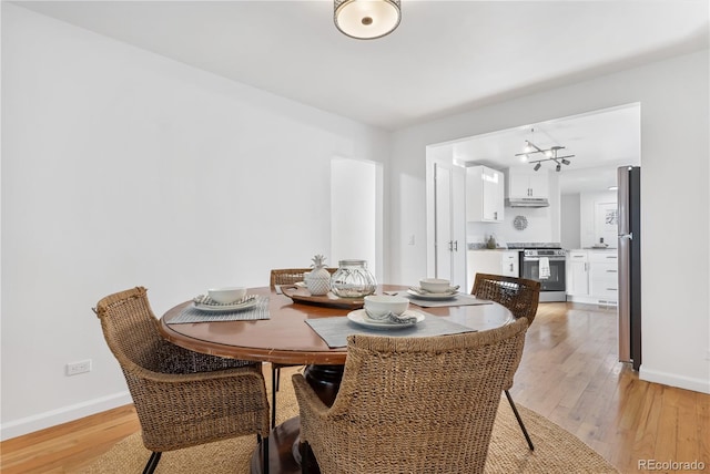 dining area featuring light hardwood / wood-style floors